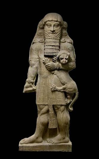 A stone statue of a person holding a lion

Description automatically generated